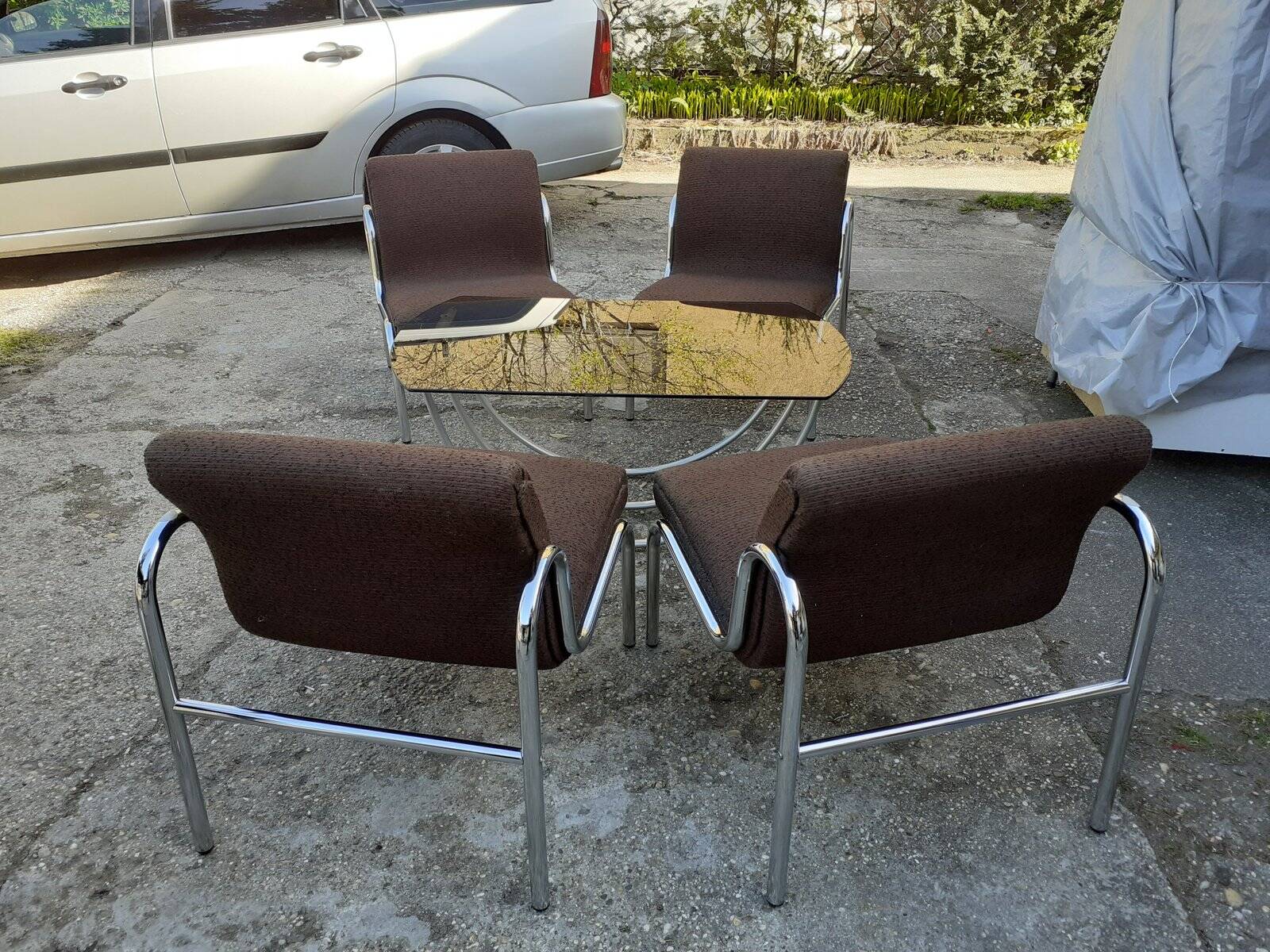 Table and 4 chairs in chrome metal with brown fabric and wood, Hungarian design from the 1960s.