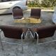 Table and 4 chairs in chrome metal with brown fabric and wood, Hungarian design from the 1960s.