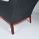 Fauteuil et repose-pieds en cuir par Kai Lyngfeldt-Larsen. Danemark, années 1960.