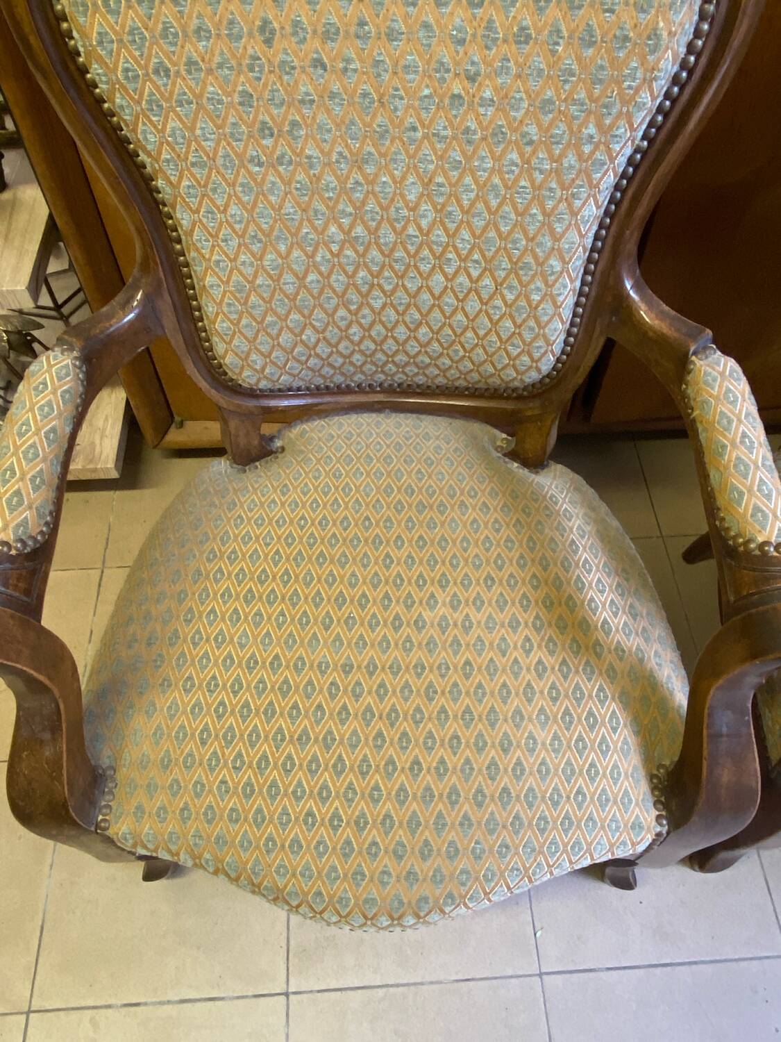 Two Louis XV style wooden and fabric armchairs