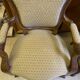 Two Louis XV style wooden and fabric armchairs