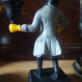 Cast iron servant monkey candle holder