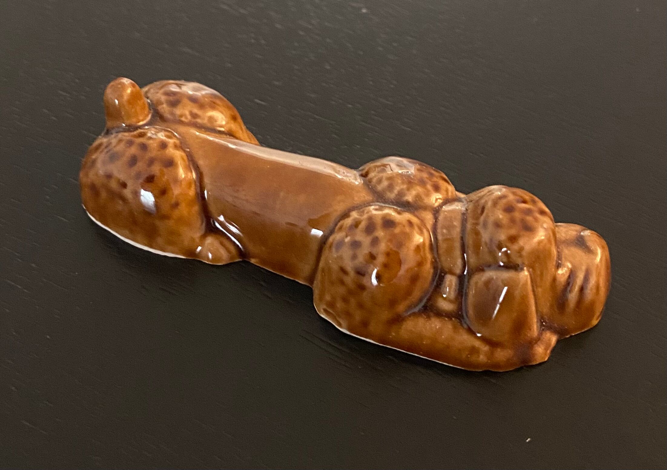 10 ceramic knife holders in the shape of a recumbent poodle