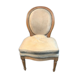 Chaise basse ou chauffeuse à dossier médaillon