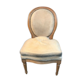 Low chair or medallion-backed heater