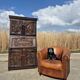 antique cabinet with carvings and wrought iron fittings rural