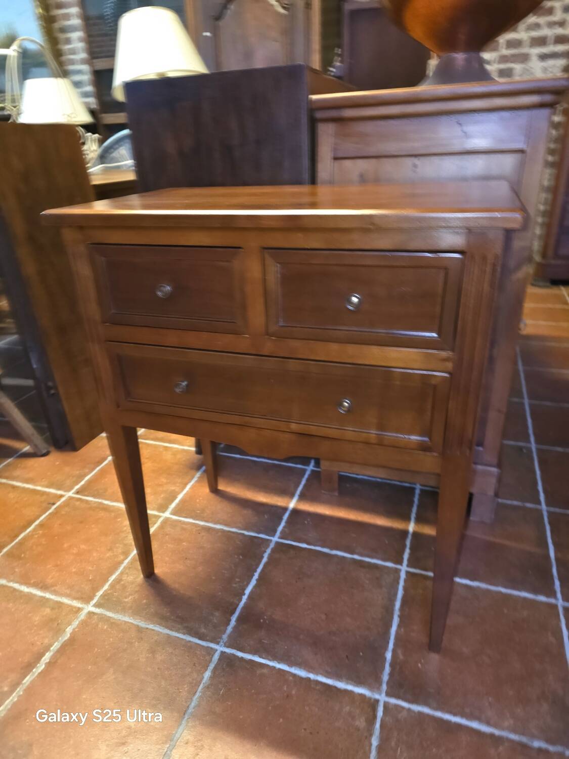 Louis XVI style commode in solid cherry wood.