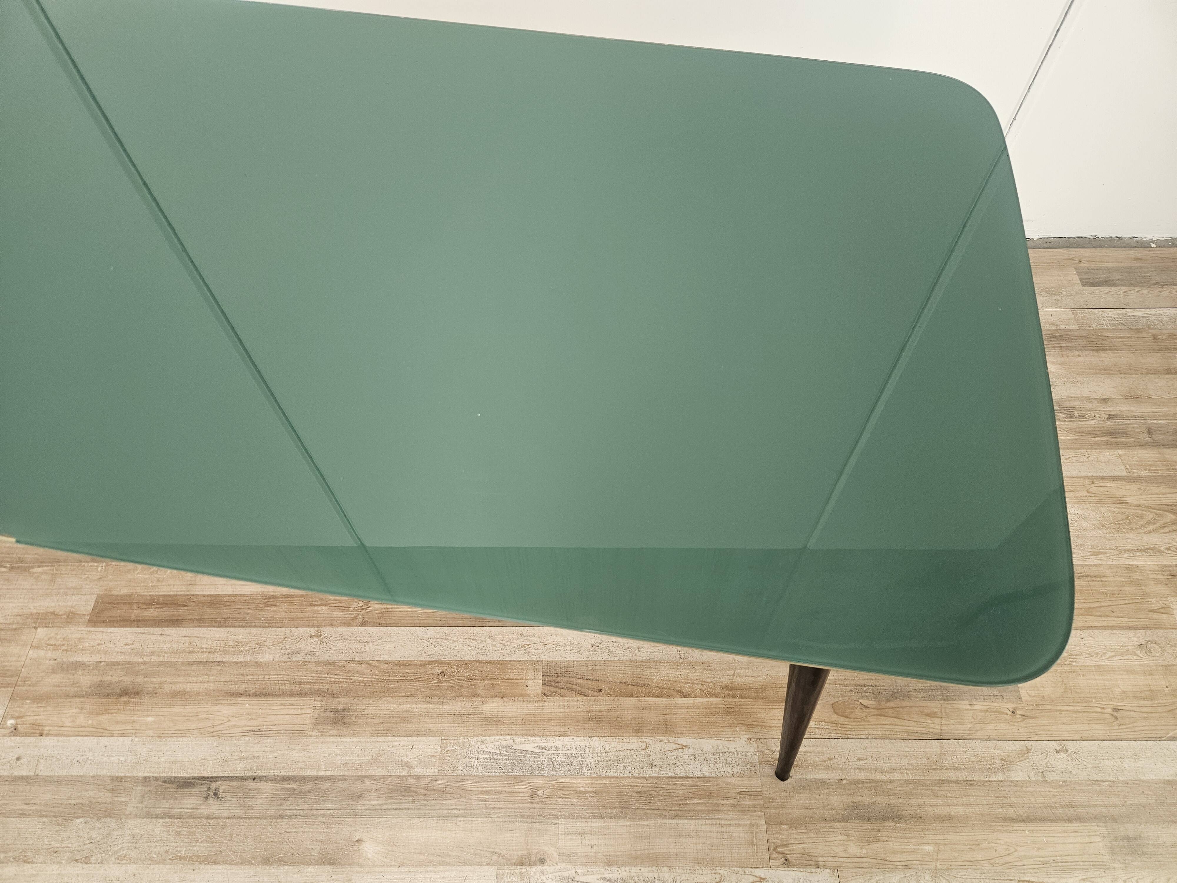 Mid-century mahogany dining table with aquamarine glass top