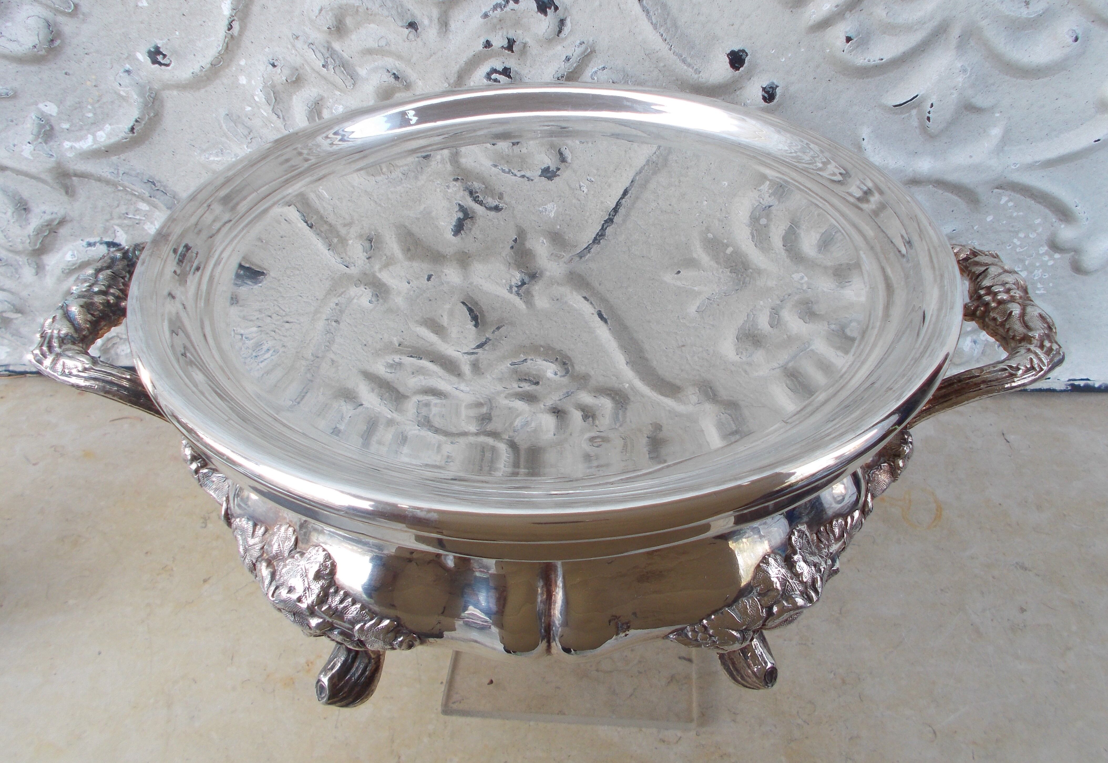 Antique silver-plated metal tealight with vine branch decoration