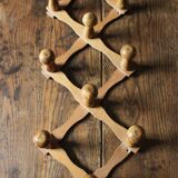 Vintage wooden ball accordion coat rack