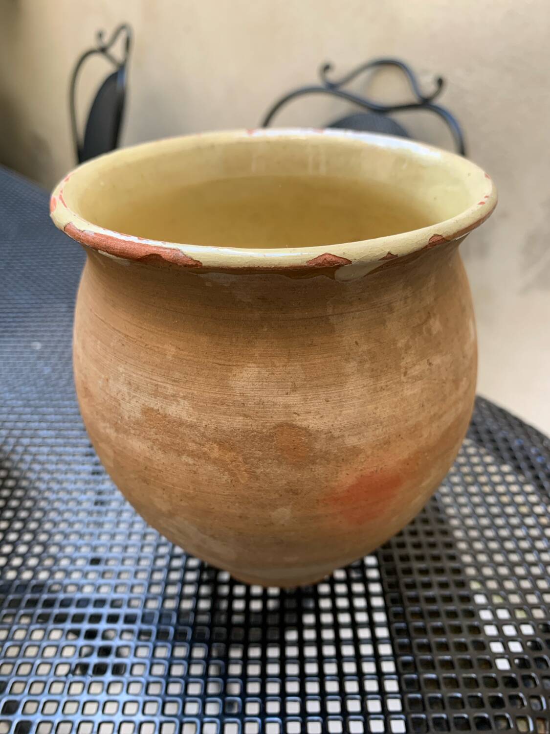 Pair of terracotta and ceramic pots
