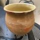 Pair of terracotta and ceramic pots