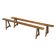 Pair of antique Victorian trestle benches in fruitwood.