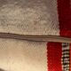 Coussin en laine rayé coloré