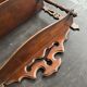 Napoleon III wall shelf in turned wood with a pediment.