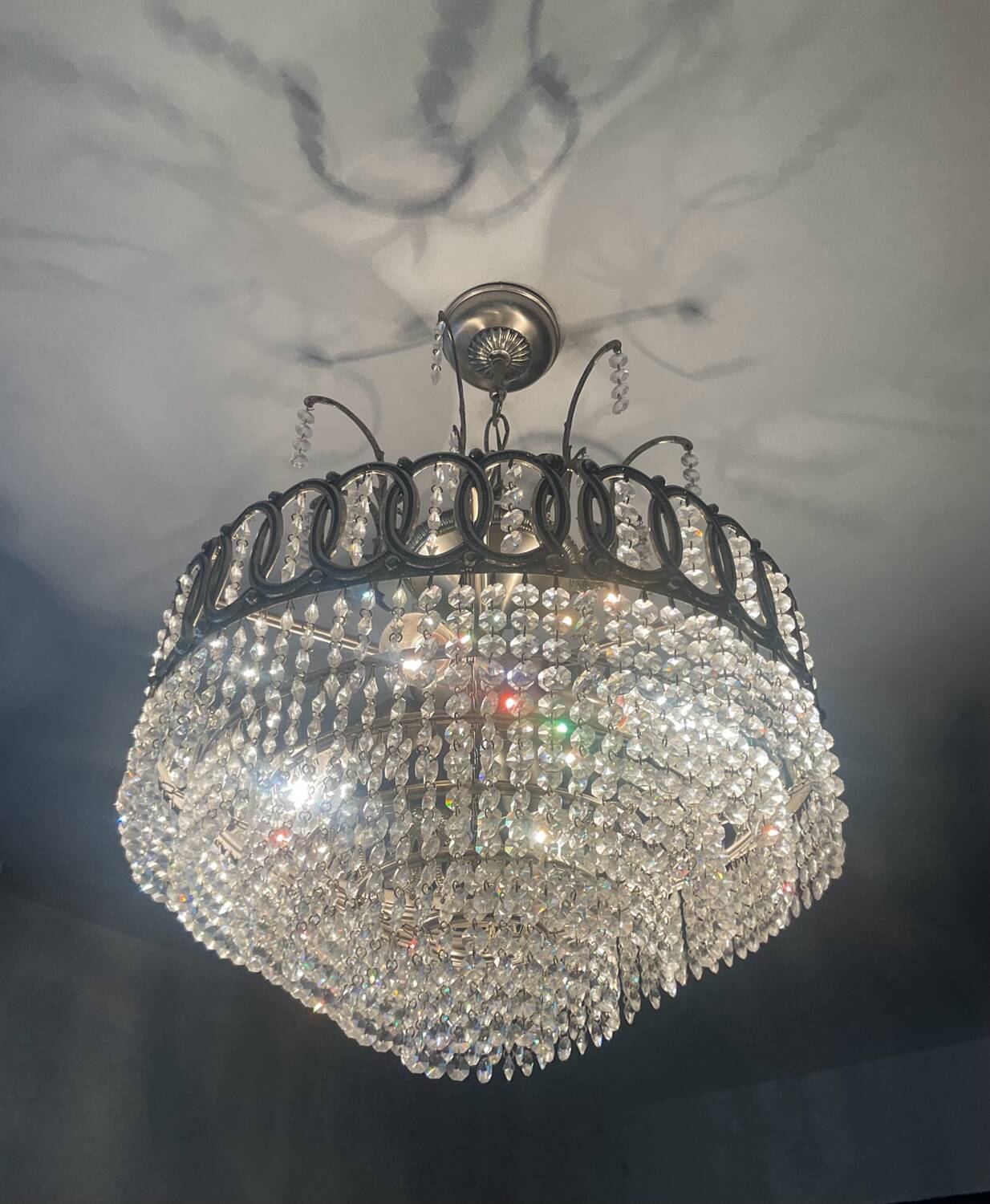 Cascading chandelier with crystal and silvered bronze pendants