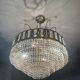Cascading chandelier with crystal and silvered bronze pendants