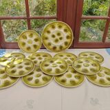 12 assiettes à huitres et plat Moulin des loups