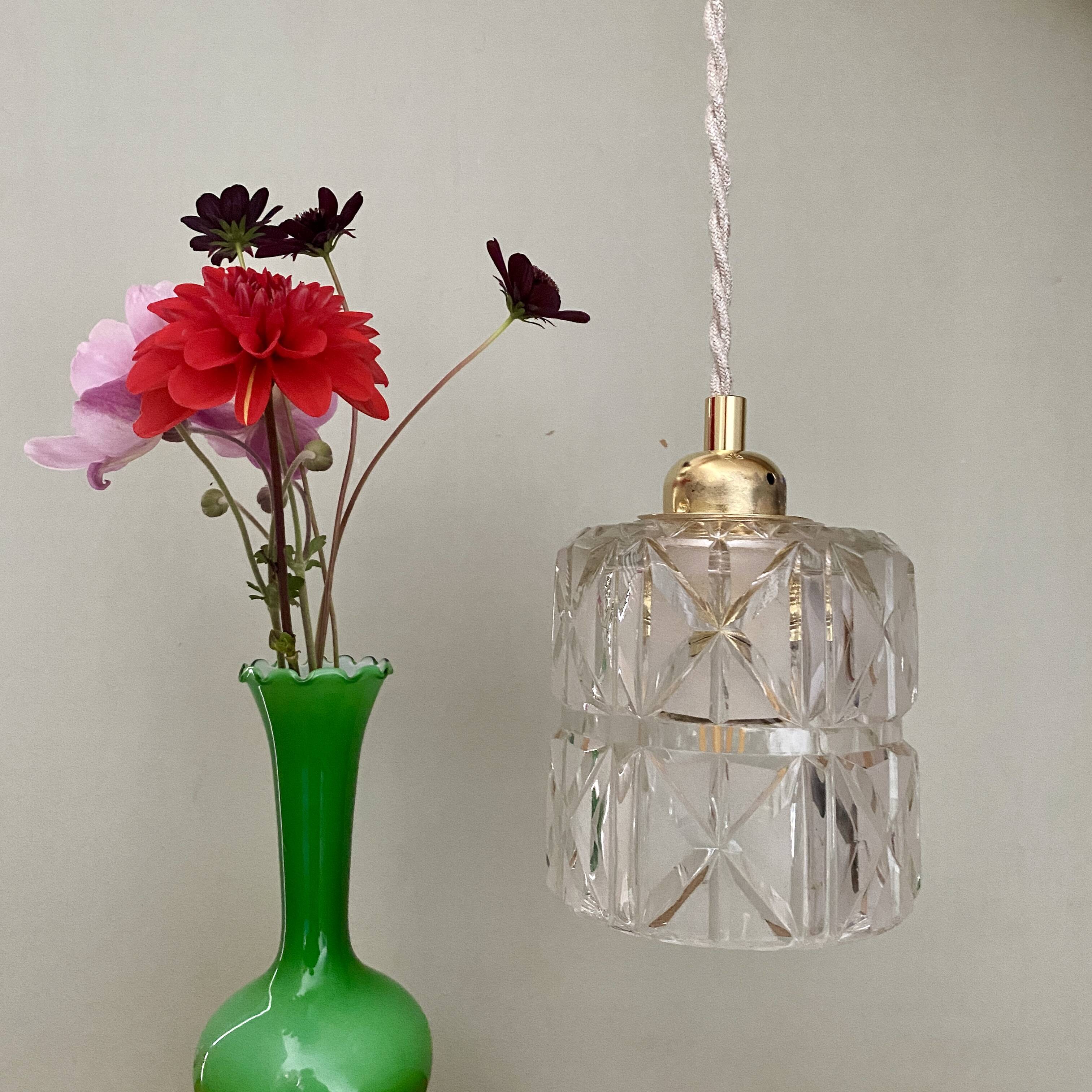 Vintage globe pendant light in thick, chiseled and frosted glass