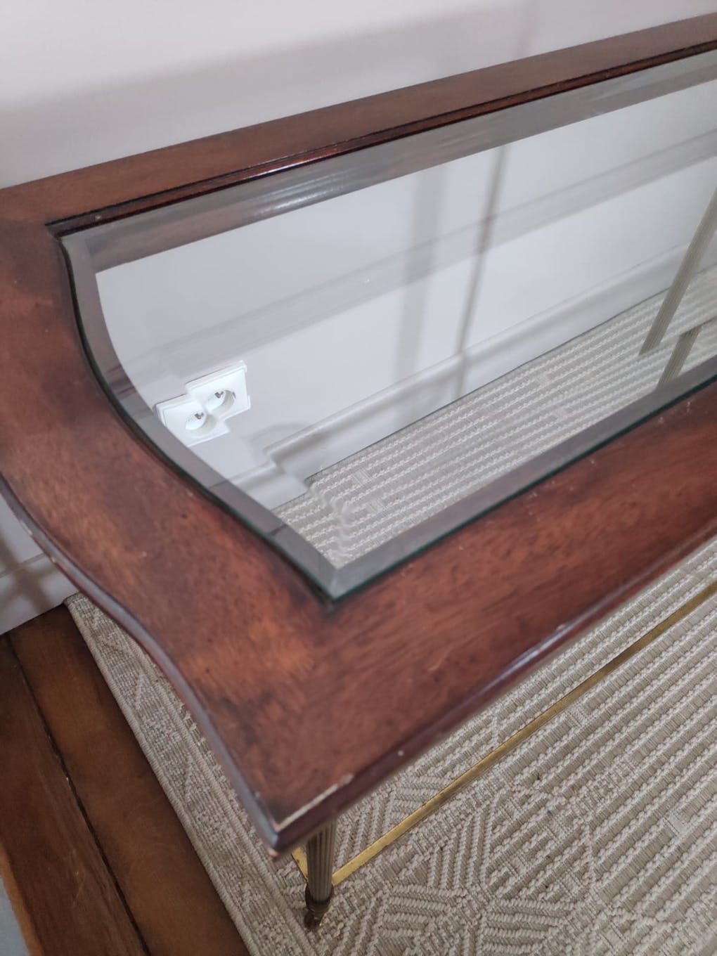 Glass and brass console table