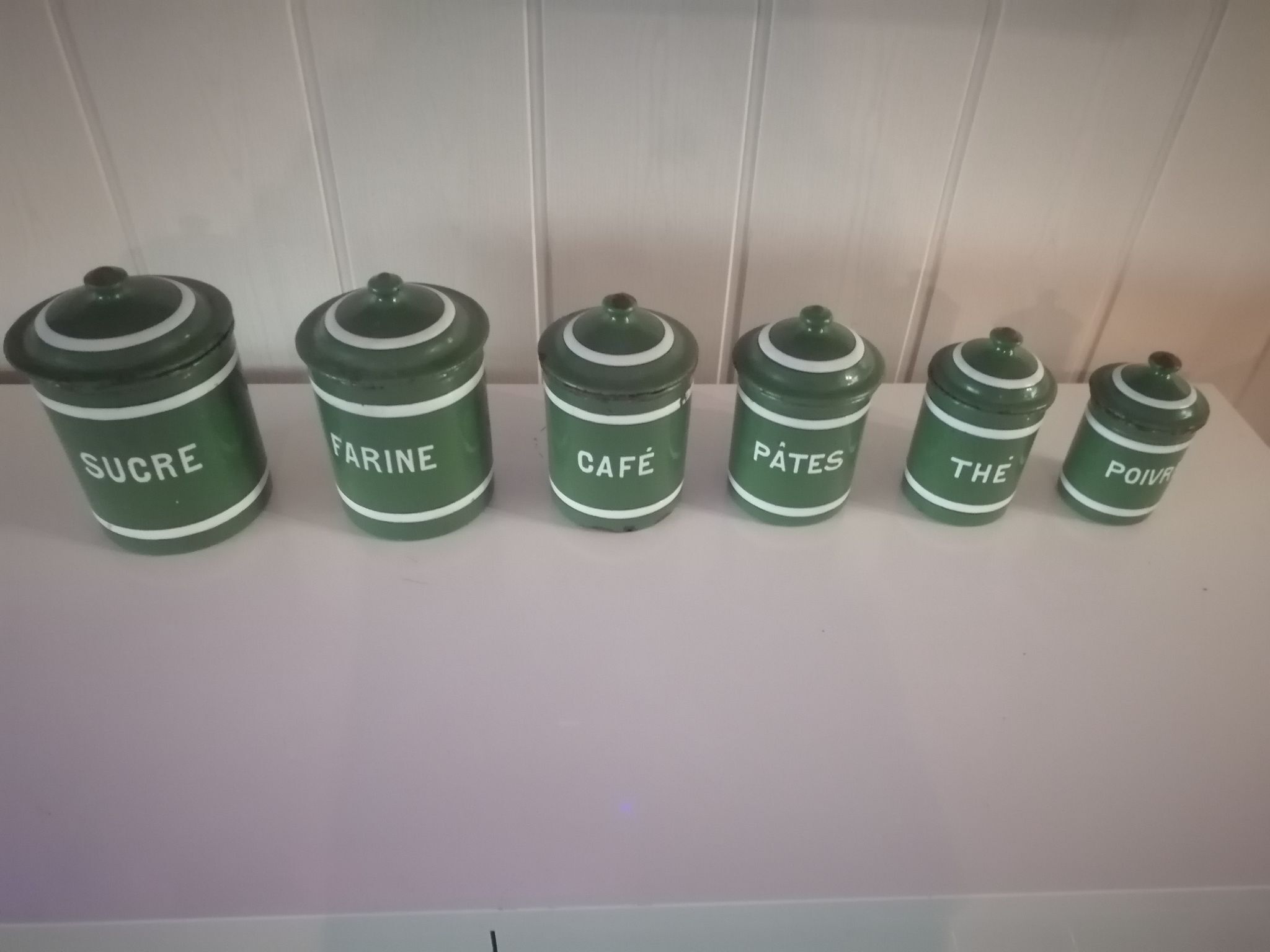 Set of 6 old enamelled jars with 6 trundle lids