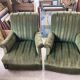 Set of two green velvet toad armchairs with fringe