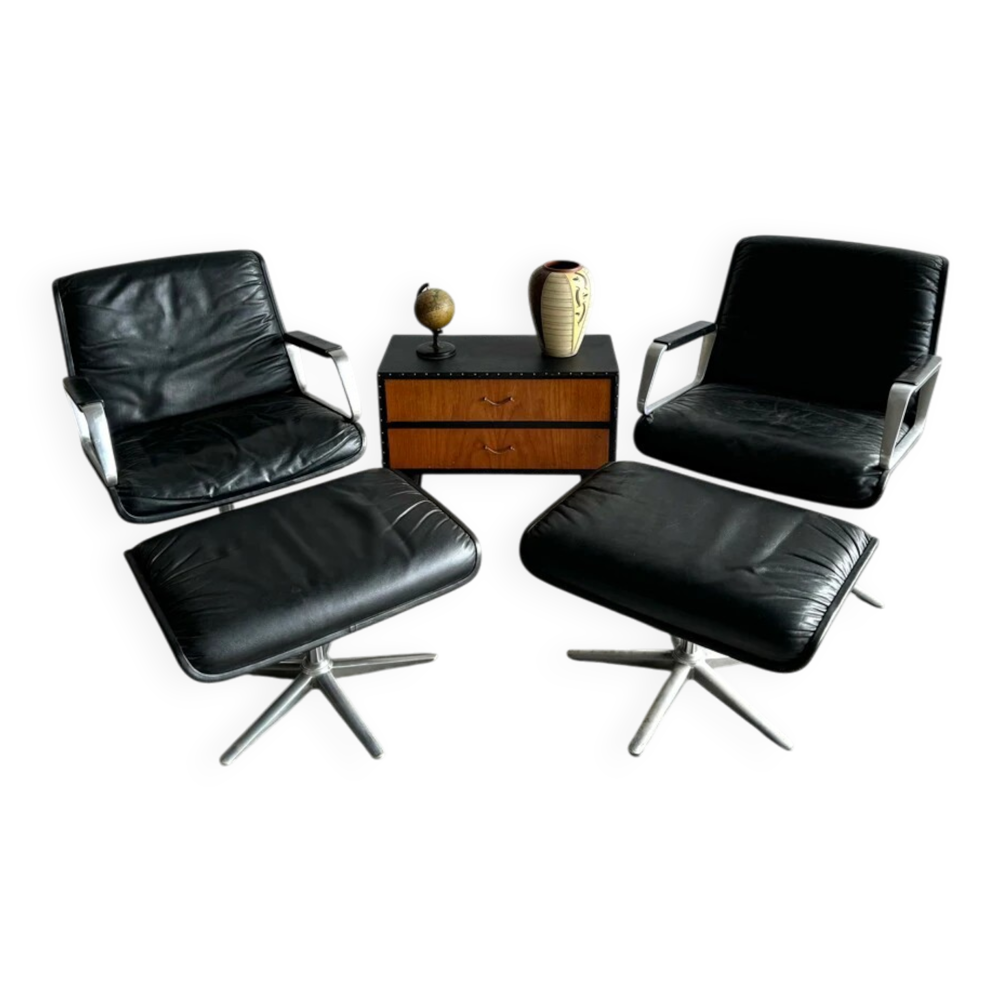 Wilkhahn Delta lounge chair in black leather with polished aluminum base and footrest (1970s)