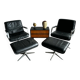 Wilkhahn Delta lounge chair in black leather with polished aluminum base and footrest (1970s)