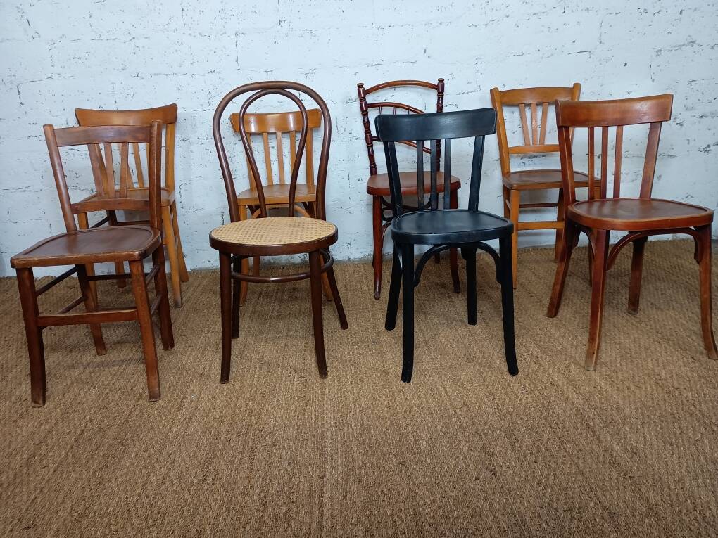 Set of 8 mismatched vintage bistro chairs