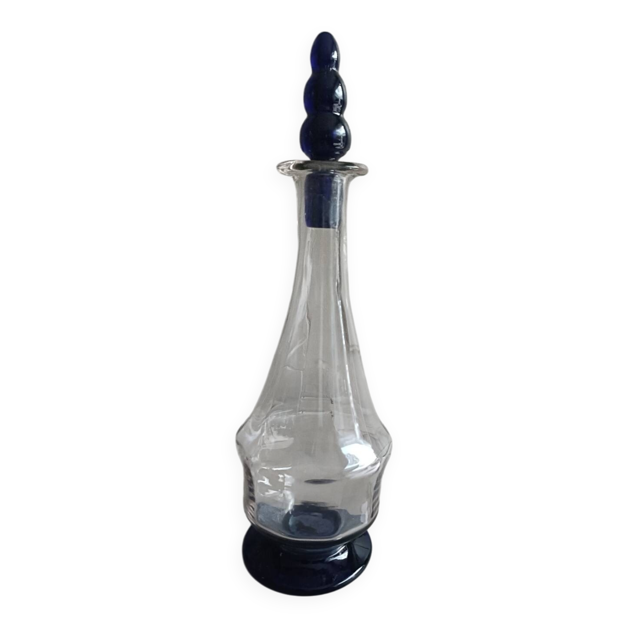 White and blue blown glass carafe