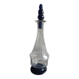 White and blue blown glass carafe
