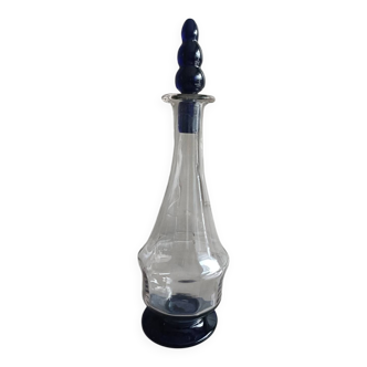 White and blue blown glass carafe