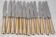 12 table knives model Baguette, golden handles, excellent condition.