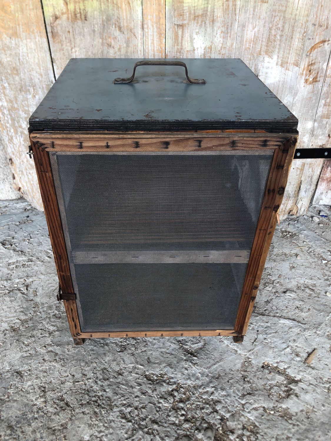 Old wooden pantry cabinet and mesh & vintage metal handle
