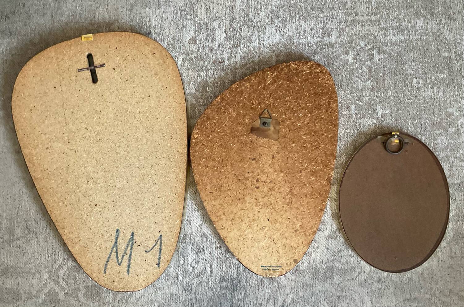 Trio of asymmetrical free-form mirrors from the 60s and 70s