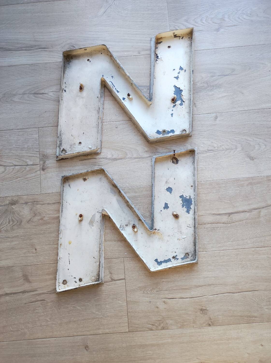 Old metal sign letter