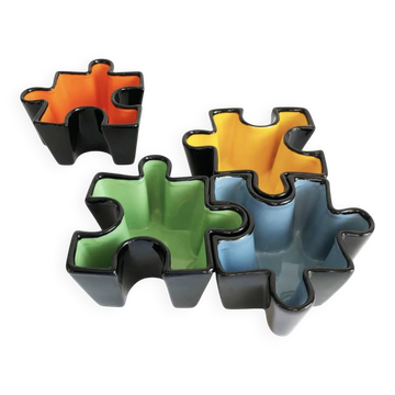 Set of ceramic puzzle pocket trays. Italy, 1980s.