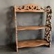 Antique shelf with openwork wooden pediment, early 20th century