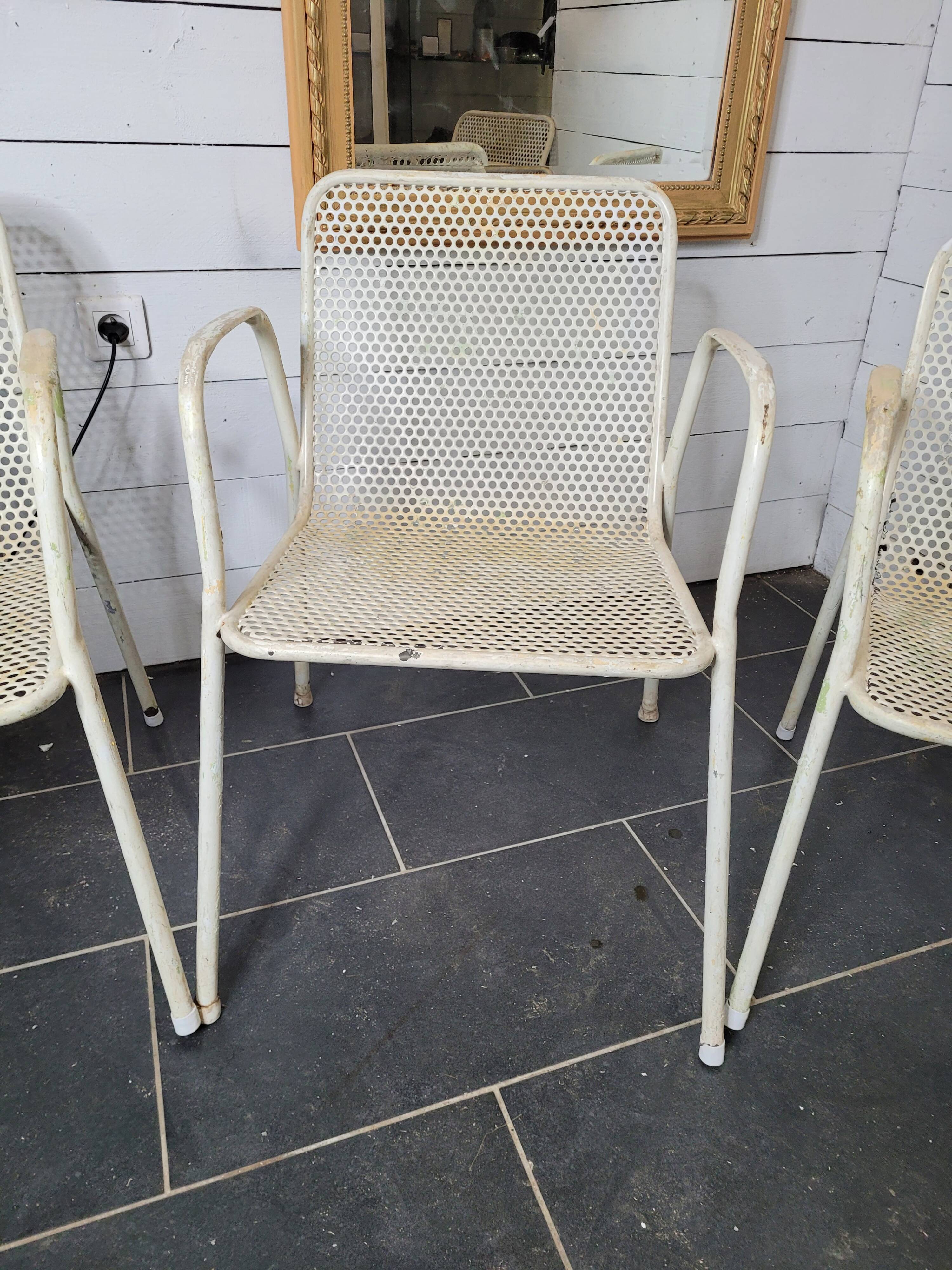 4 perforated metal garden armchairs