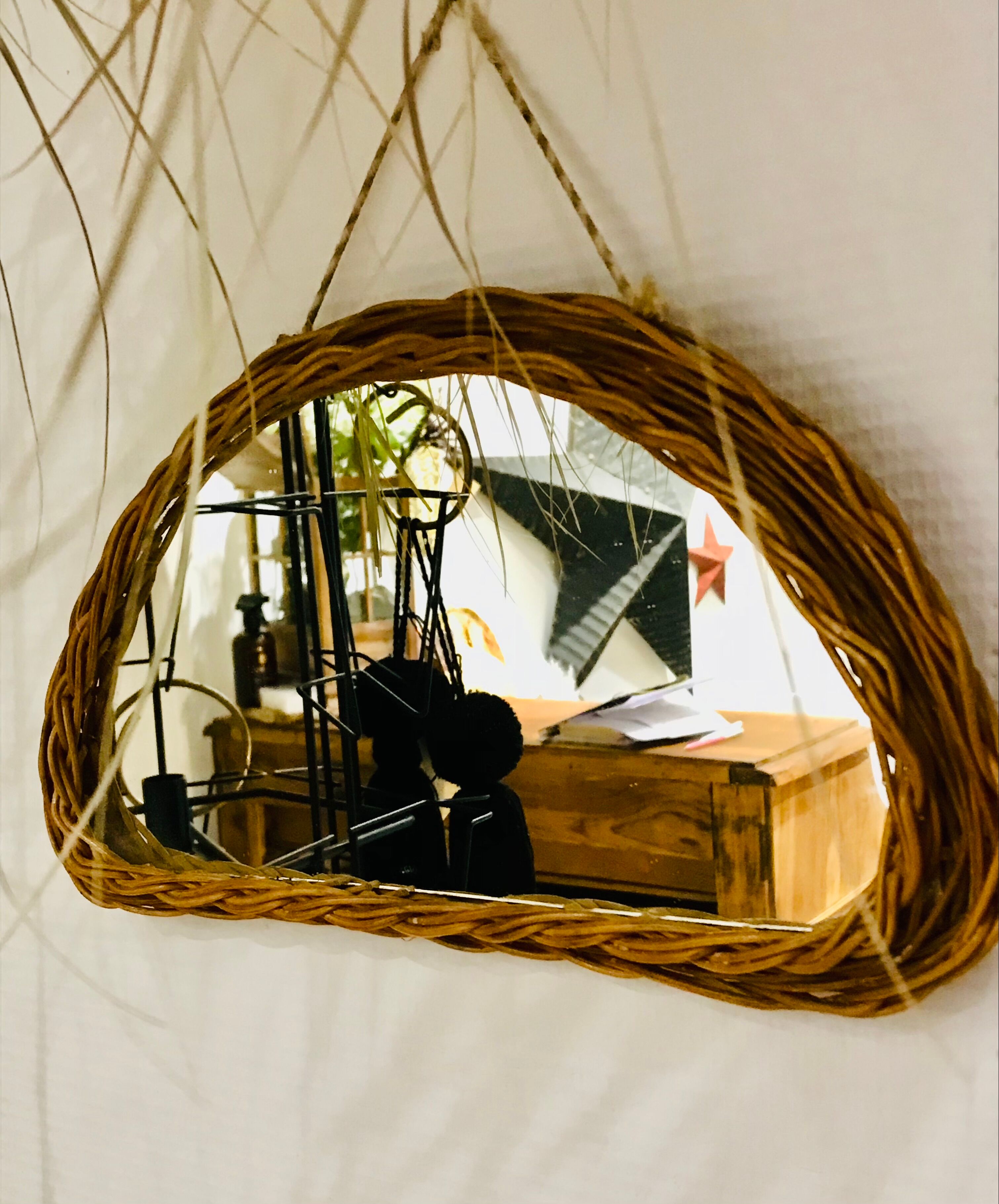 Vintage half moon rattan mirror