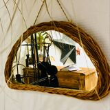 Vintage half moon rattan mirror
