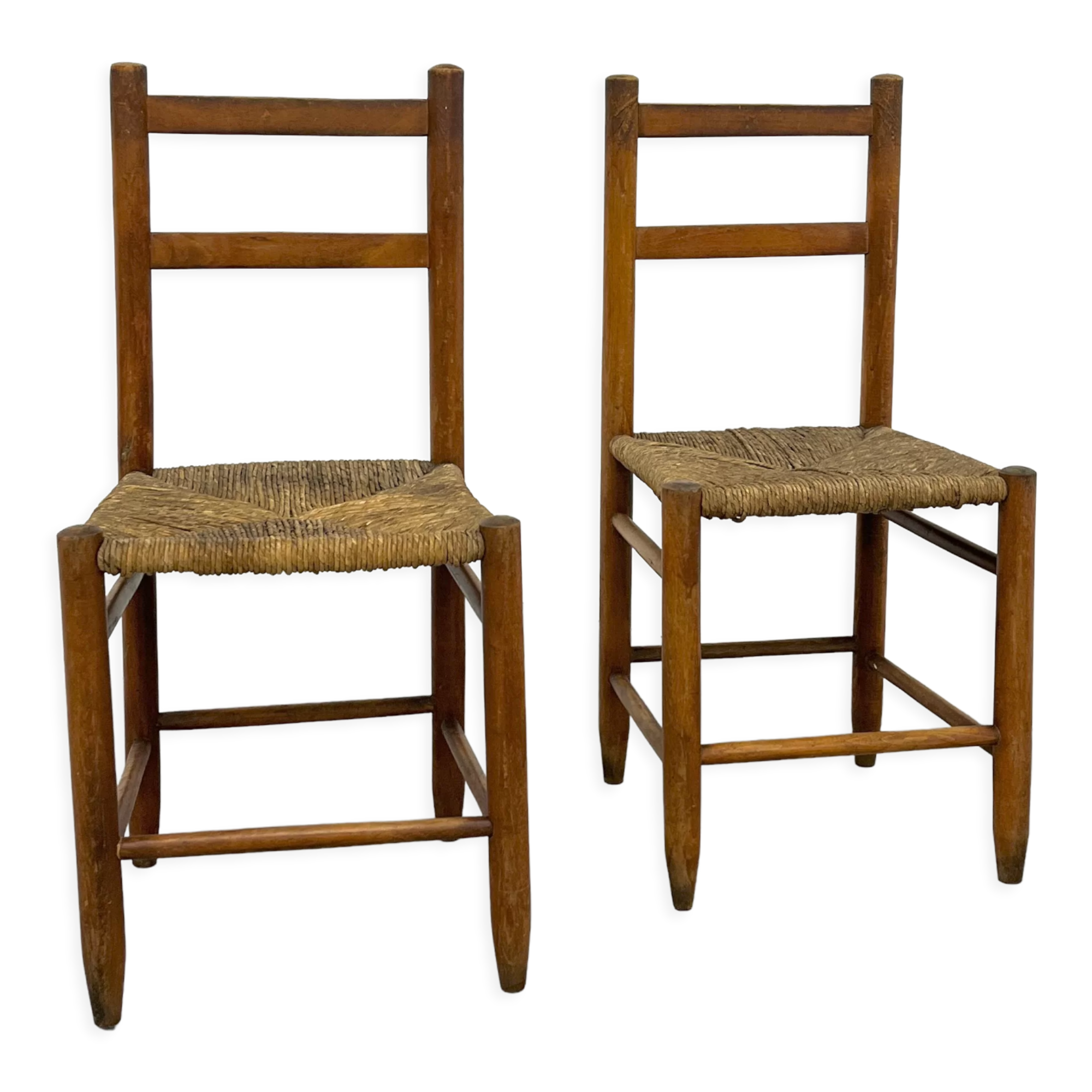 Pair of vintage wooden chairs with mulched seat