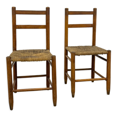 Paire de chaises vintage en bois avec assise paillée