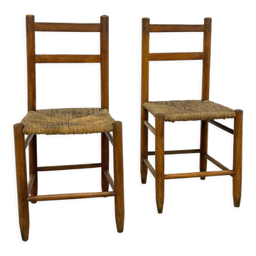 Pair of vintage wooden chairs with mulched seat