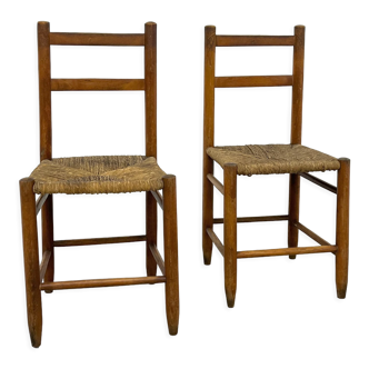 Pair of vintage wooden chairs with mulched seat