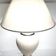 Vintage white ceramic table lamp, ribbed body and conical shade.