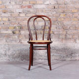 Curved wooden chair and tuna-