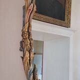Mirror and its carved wooden sconces