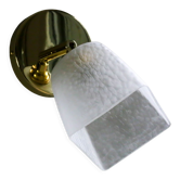 Translucent antique glass wall lamp mounted on a brass metal stand