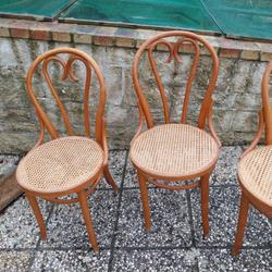 4 tanned bistro chairs